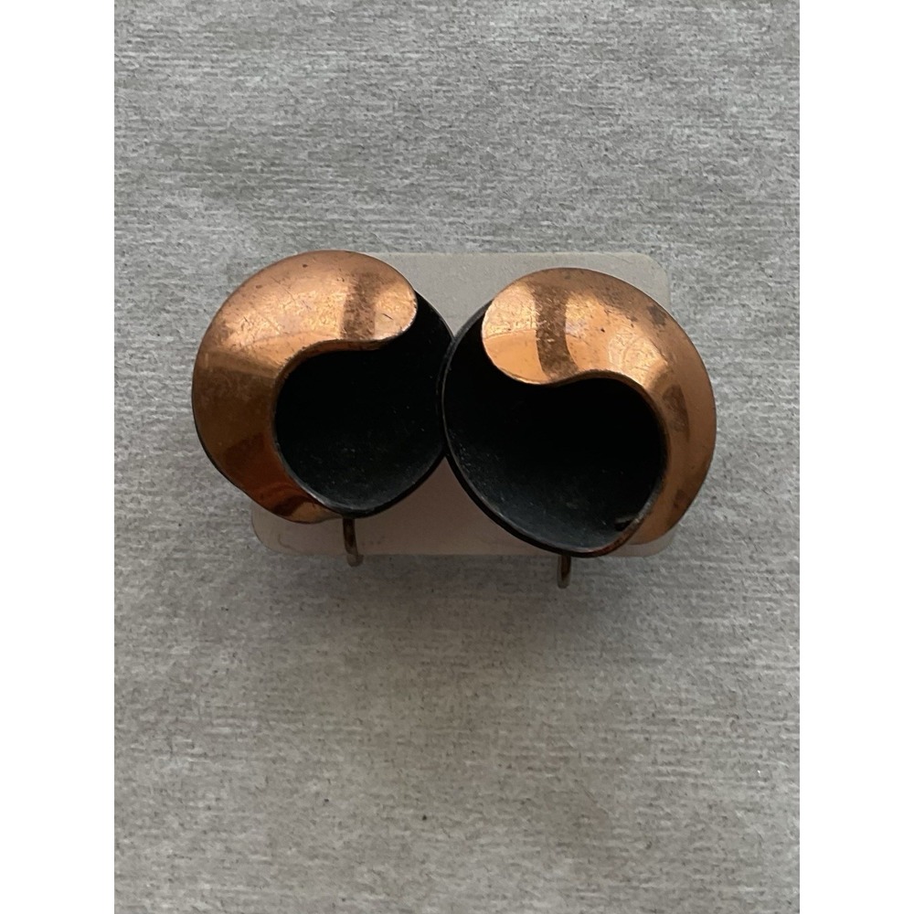 Vintage modernist clip-on earrings polished copper-tone swirling designs Estate